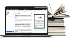 Manuscript open on a laptop beside a stack of books